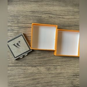 NIB: A designer inspo compact mirror with box.